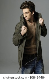 Fashion Shot Of A Young Man In Coat. He Is Now A Professional Model.