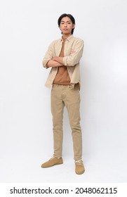 Fashion And Style , Full Body Young Man Wearing Shirt With Khaki Pants With Arms Crossed Posing In Studio