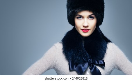 Fashion Style Portrait Of A Woman In An Elegant Winter Fury Clothes