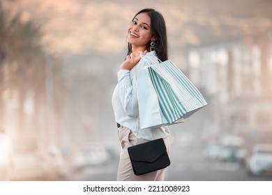 Fashion, Style And Shopping Bags With A Woman Out On An Urban City Street Enjoying A Spending Spree. Stylish And Rich Arab Female Customer Or Tourist Happy After Buying Items On Discount Sale