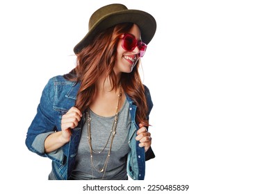 Fashion, trendy and happy woman in studio with casual, stylish and funky outfit with accessories. Happiness, smile and female model with hat, sunglasses and edgy clothes isolated by white background.
