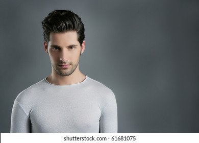 Fashion Trendy Young Man Silver Futuristic  Portrait Over Gray