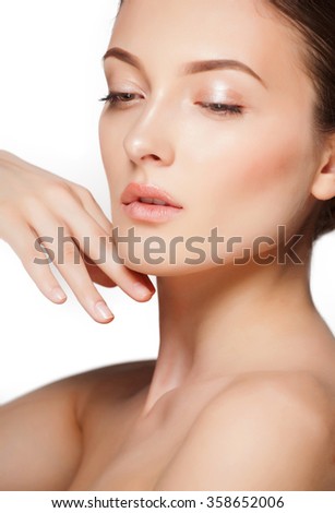 Fashion woman with beautiful face - isolated on white. Skin care concept.