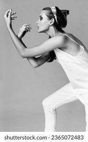 Fashion woman model editorial posing in the studio - Shutterstock ID 2365072483