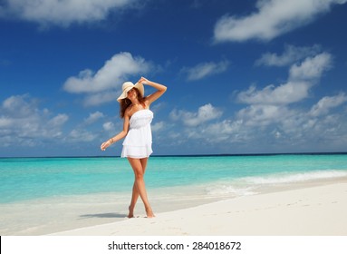 Fashion Woman On The Beach