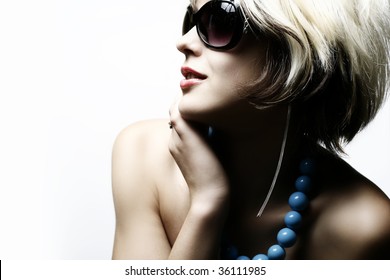 Fashion Woman Portrait Wearing Sunglasses On White Background