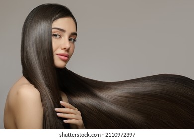 Fashion woman with straight long shiny hair. Beauty and hair care - Shutterstock ID 2110972397