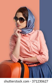 Fashion woman in sunglasses and scarf. studio shot - Shutterstock ID 371230627