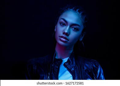 Fashion Young African Girl Woman Looking At The Camera Isolated On A Black Studio Background, Portrait, Copy Space