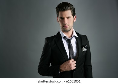 Fashion Young Businessman Black Suit Casual Tie On Gray Background