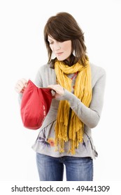 Fashion Young Woman With Red Bag Looking Inside