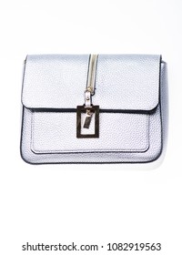 Fashionable Accessories Concept. Purse Made Out Of Silver Leather On White Background, Isolated. Handbag For Women With Zip And Metallic Decorative Detail. Purse, Bag Or Handbag On White Background.