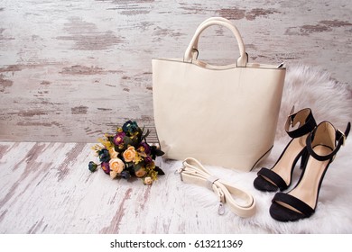 nude clutch and shoes