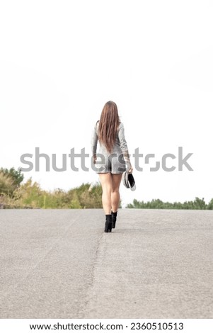 Similar – Image, Stock Photo Brunette girl holding surfboard over head and walking