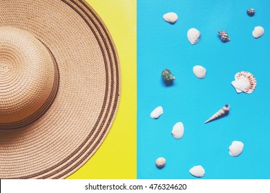 Fashionable Hat And Shells On A Blue Background. Travel Concept. Flat Lay Photo, Top View