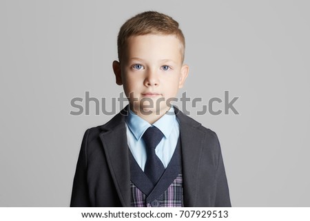 fashionable little boy in a three-piece suit.fashion child portrait.elegant kid 