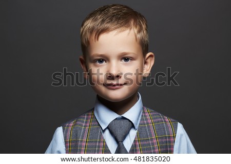 fashionable little boy.smiling funny child in suit and tie. fashion children
