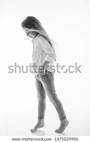 Similar – fashionable girl in black glasses sitting on an iron barrel