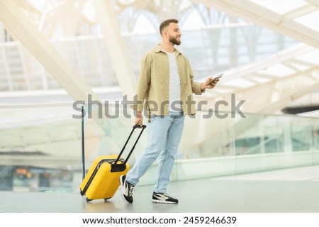 Similar – Image, Stock Photo Man traveling solo by train looking outside the window