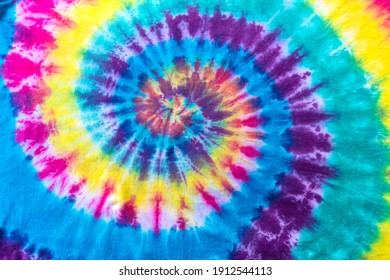 Fashionable Pastel Blue, Yellow Red, Green, Purple Retro Abstract Psychedelic Tie Dye Swirl Design.