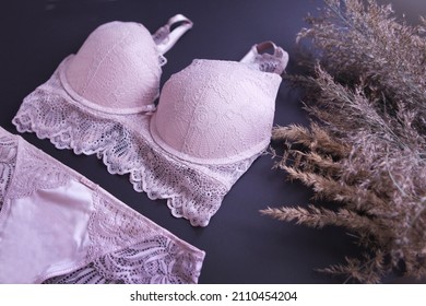 Fashionable pink lingerie close-up with lace. Sewing women's underwear. sexy intimate clothing