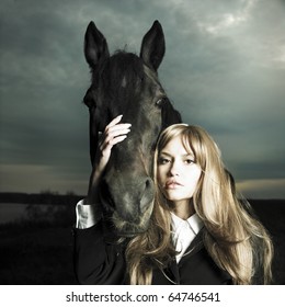 Fashionable Portrait Of A Beautiful Young Woman And Horse