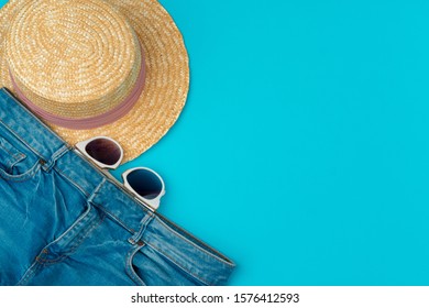 Fashionable Woman Clothes Flatlay On Blue Background