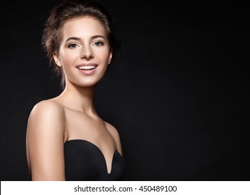 Fashionable Woman With Red Lipstick And Short Hair On Black Background