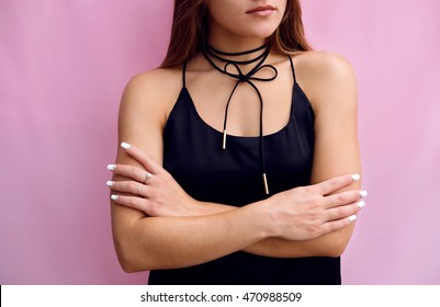 Fashionable Woman With Stylish Black Choker Jewelry On Her Neck .