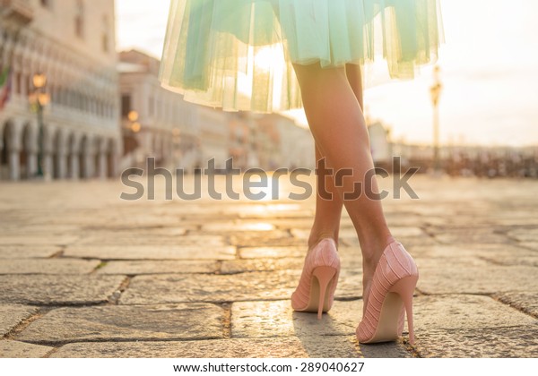 Fashionable woman wearing\
high heel shoes