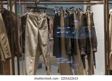 Fashionable Women's Clothing In A Shop Window. Stylish Autumn Winter Collection. 