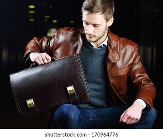 Fashionable Young Man With Leather Clothes On