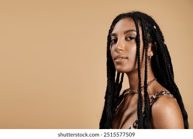 A fashionable young woman showcases her unique style with long braids and elegant attire. - Powered by Shutterstock