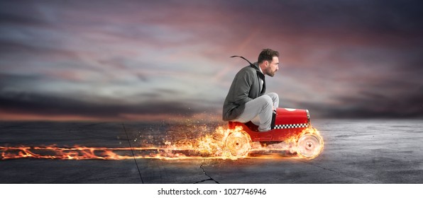 Fast businessman with a car wins against the competitors. Concept of success and competition - Shutterstock ID 1027746946