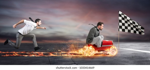 Fast businessman with a car wins against the competitors. Concept of success and competition - Shutterstock ID 1033414669