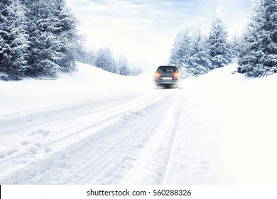 Fast Car On Winter Road And Snow Splash 