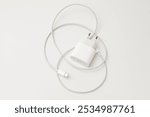 Fast charger for iPhone with lighting cable on white background.