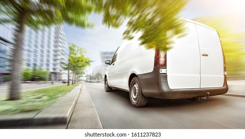 Fast Driving Delivery Van Inside A City