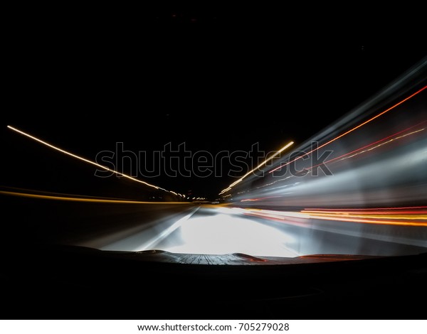 Fast driving on the car at
night.
