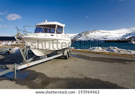 Fast fishing boat on a trailer