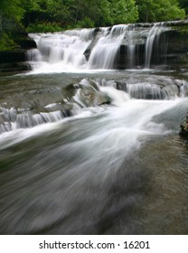 Fast flowing river waterfalls were one of the many in Robert Treman State Park, Ithaca, NY.
