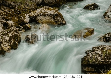 fast flowing wate from a torrent during hiking in spring and austria
