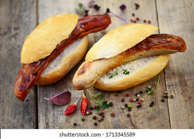 Fast Food, Bratwurst With Bun And Mustard, Closeup.