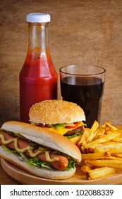 Fast Food With Burger, Hot Dog, French Fries, Tomato Ketchup And Cola