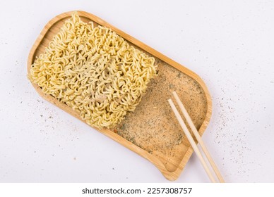 Fast food, chinese noodles with spices on the wooden background - Shutterstock ID 2257308757
