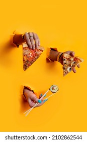 fast food concept with copy space. pizza slices and sushi roll on yellow background with copy space. take away concept. holding pizza slice and sushi
