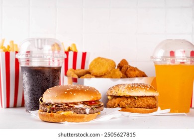 Fast food delivery menu background with various burgers, cheeseburger, nuggets, french fries, fizzy soda drinks. Junk unhealthy fast food, Ultra processed food with low nutrition, high calories value - Powered by Shutterstock