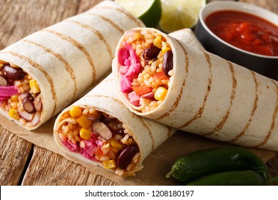 Fast Food Grilled Veggie Burrito With Rice And Vegetables Close-up On The Table. Horizontal, Rustic Style
