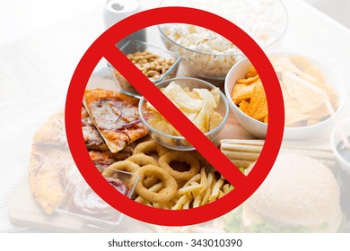 Fast Food, Low Carb Diet, Fattening And Unhealthy Eating Concept -close Up Of Fast Food Snacks And Cola Drink Behind No Symbol Or Circle-backslash Prohibition Sign