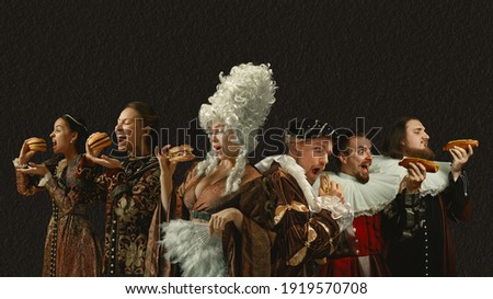 Fast food tastes good. Medieval people as a royalty persons in vintage clothing on dark background. Concept of comparison of eras, modernity and renaissance, baroque style. Creative collage.